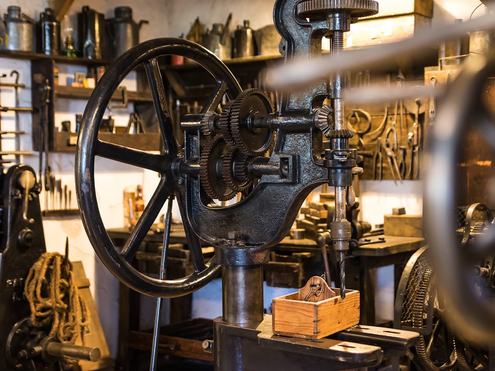 Old pillar drill in a traditional engineering workshop